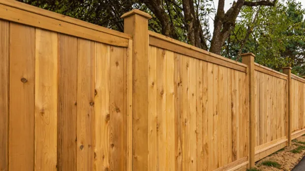 1.8m timber fence with decorative post caps and picture frame detail