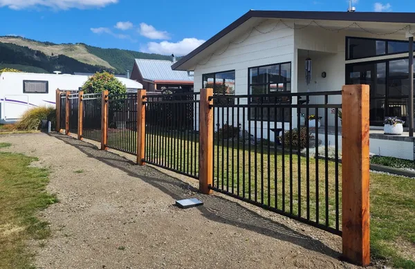 Fentec Mansion panels with stained timber sleepers