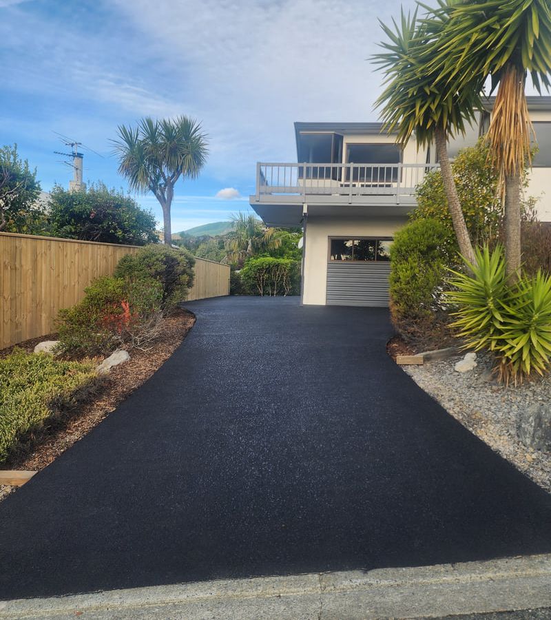 Newly completed concrete driveway showing professional concrete finishing and quality workmanship for residential property in Nelson Tasman