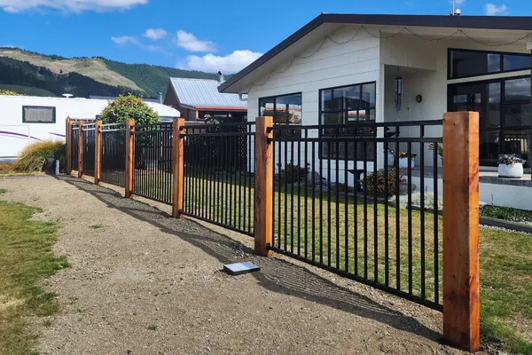 Fentec Mansion panels with stained timber sleepers