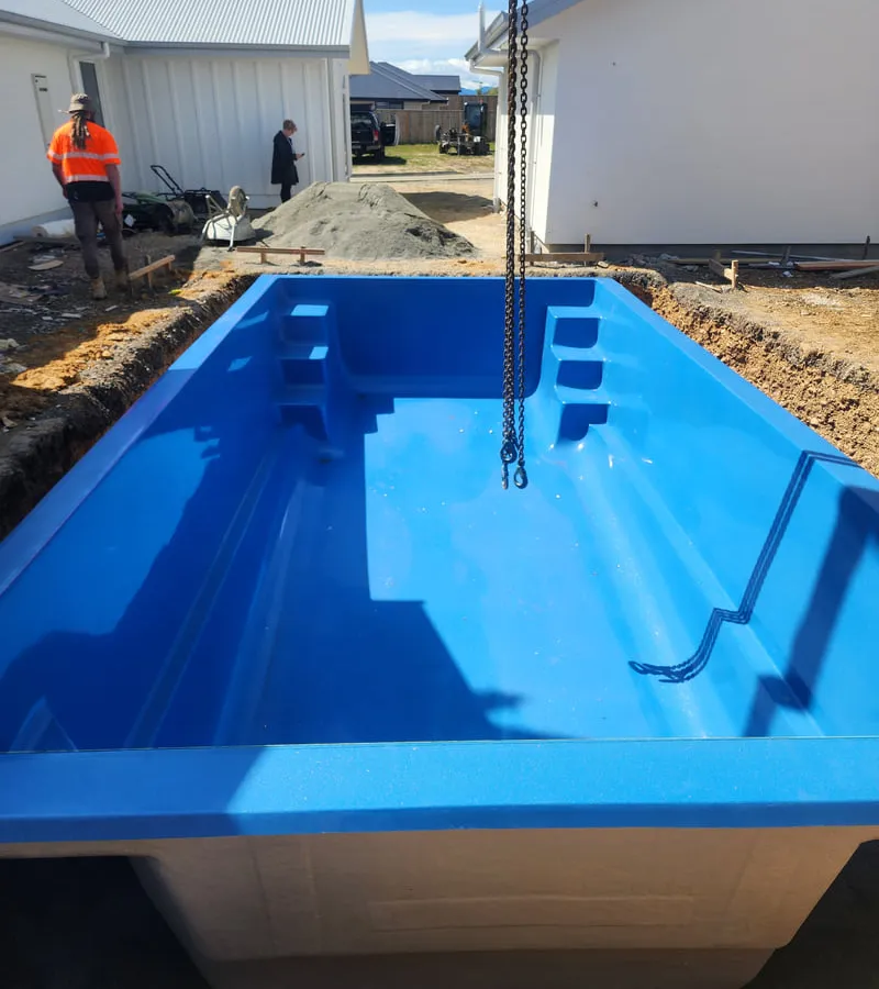 Professional swimming pool excavation showing precise site preparation and foundation work for pool installation in Nelson Tasman backyard