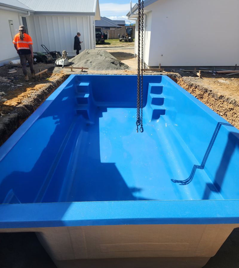 Professional swimming pool excavation showing precise site preparation and foundation work for pool installation in Nelson Tasman backyard